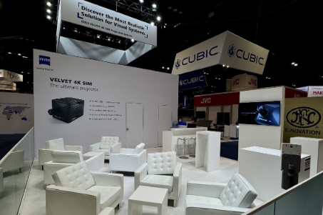 A professional meeting zone inside the ZEISS trade show stand, optimized for technical B2B discussions and product consultations during the I/ITSEC event.