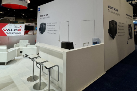 A professional meeting zone inside the ZEISS trade show stand, optimized for technical B2B discussions and product consultations during the I/ITSEC event.